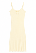 J.Marin's Betsy tank dress in sunshine yellow. A soft pointelle dress with slim straps, scoop neckline, center tie, and vintage-inspired fit. Below the knee length. Made in the USA from 100% cotton. 