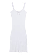 J.Marin's Betsy tank dress in white. A soft pointelle dress with slim straps, scoop neckline, center tie, and vintage-inspired fit. Below the knee length. Made in the USA from 100% cotton.