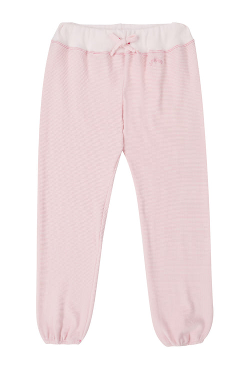 J.Marin's soft thermal knit sweatpant with elastic drawstring waist, cuffed ankles, and vintage sportswear fit. Made in the USA from 100% cotton. Two-tone pink with pink contrast stitching.